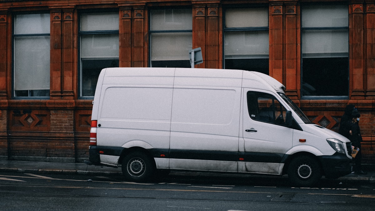 Delivery van parked on a city street, ready for last-mile routes